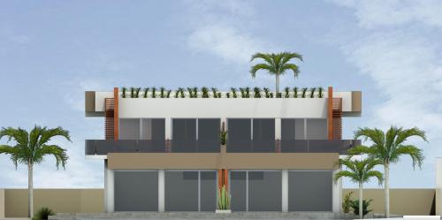 アグリジェントにあるAgrigentum Apartmentのヤシの木が立ち並ぶ建物