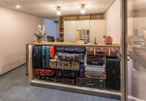 a display case filled with lots of suitcases at Schumanns Garten in Weißenfels