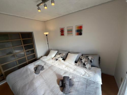 Ένα ή περισσότερα κρεβάτια σε δωμάτιο στο 伊勢ヒルトップ アパートメント