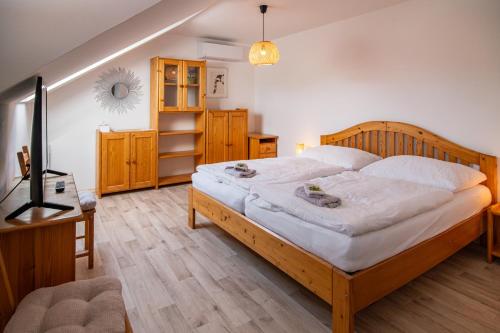 Ένα ή περισσότερα κρεβάτια σε δωμάτιο στο Summerhouse penzion Bavory