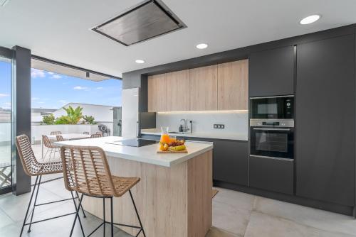 Η κουζίνα ή μικρή κουζίνα στο Villa Aurea, Piscina privada, Solárium, Vistas