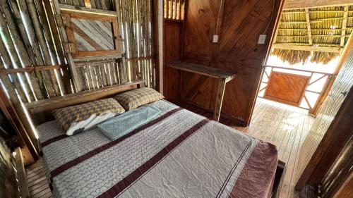Postel nebo postele na pokoji v ubytování Islas de San blas cabaña privada en Tubasenika