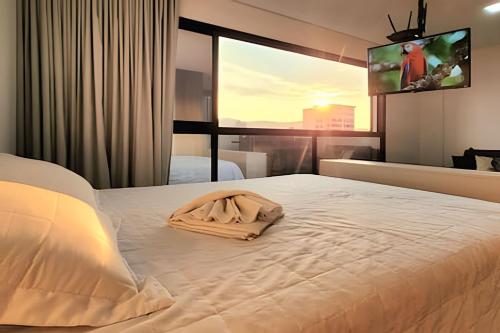 Postel nebo postele na pokoji v ubytování Residencial GO 305 -