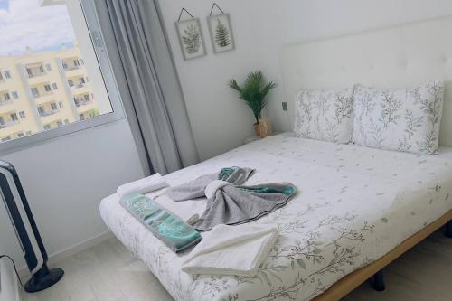 Giường trong phòng chung tại Ocean Garden Suite Sunrise View