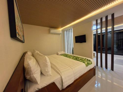 Televisyen dan/atau pusat hiburan di Seminyak Apartment 37