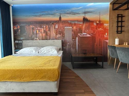 a bedroom with a view of a city at EASY RENT Apartments- Unia Art Residence 130, Basen & SPA, Centrum Free Parking 24h Check-in in Lublin