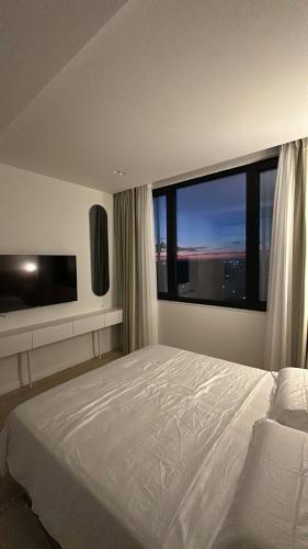 Sunset Apartment 객실 침대