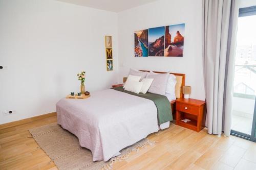 Ένα ή περισσότερα κρεβάτια σε δωμάτιο στο Cozy Apartment Riviera Palmeraie