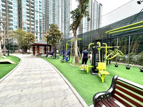 a park with a playground with slides and swings at Masteri Pearl Apartment - Luxury view in Ocean Park 1 in Gia Lâm Pho