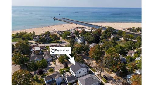 an aerial view of a house on a beach at expERIEnce in South Haven