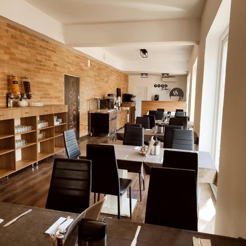 Posezení v ubytování Öreg-tó Hotel és Rendezvénytér