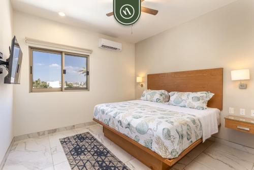 Postel nebo postele na pokoji v ubytování Centric Apt in Downtown - Rooftop Pool - Terrace