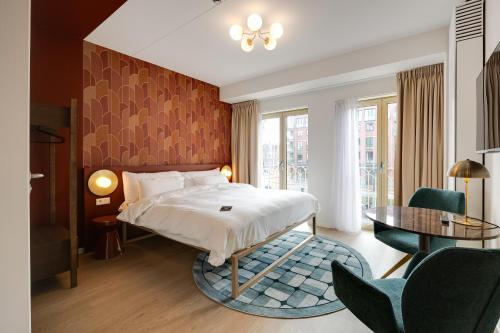 Katil atau katil-katil dalam bilik di Duke Studio Hotel