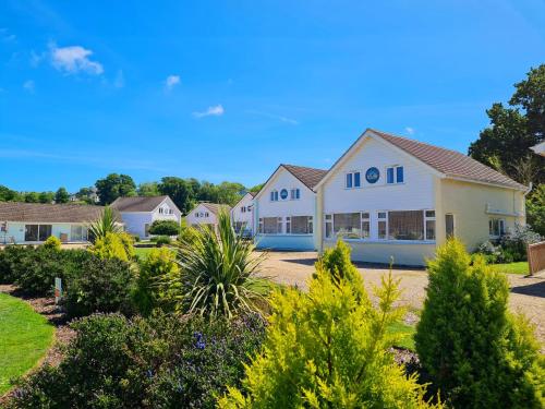 a house with the number on it at Seaview Holidays - Salterns Village in Seaview