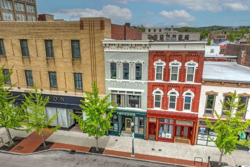 an overhead view of a city street with buildings at The Heart of Madison Suites in Covington