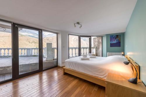 Postel nebo postele na pokoji v ubytování L'accès Lac Rivage - Accès privatif au Lac dAnnecy