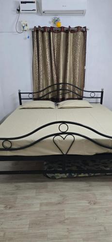 Postel nebo postele na pokoji v ubytování Nila Home Stay