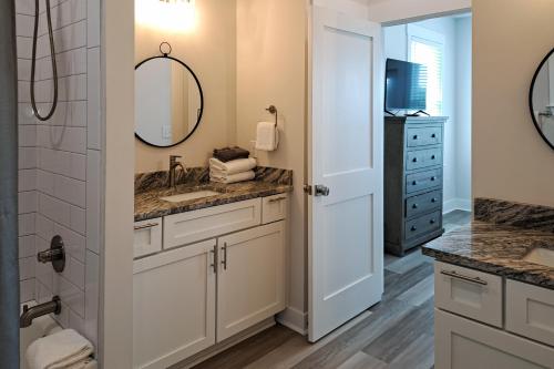a bathroom with a sink and a mirror at Bay to Breakers in Fort Morgan