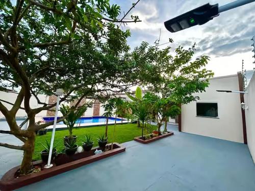 Swimmingpoolen hos eller tæt på Recanto do Aconchego Prime