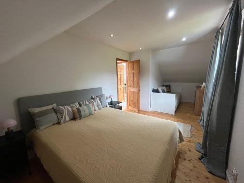 a bedroom with a large bed in a room at Apartmán za Holubnicou in Spišská Nová Ves