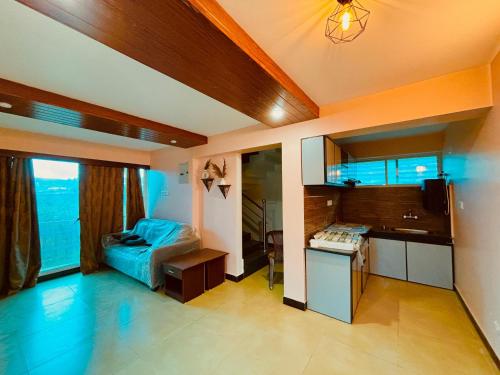 Ένα ή περισσότερα κρεβάτια σε δωμάτιο στο Ruby home stay