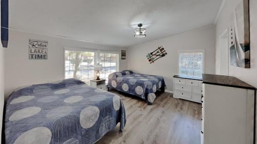 En eller flere senge i et værelse på Island Club #113