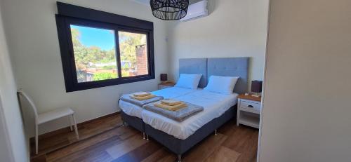 Giường trong phòng chung tại Apartamento a estrenar en Shangrilá - 2 dormitorios