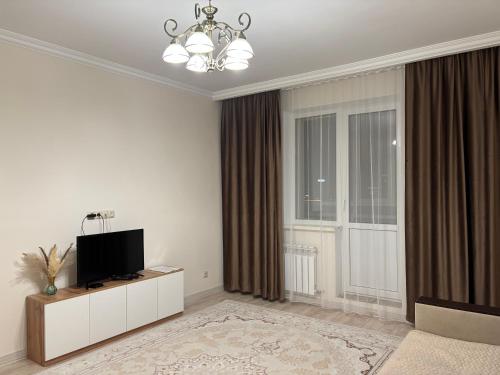 TV a/nebo společenská místnost v ubytování Rent Apartments