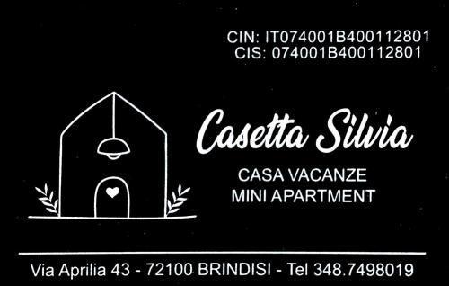 a sign for a restaurant with a bird house at Casetta Silvia in Brindisi
