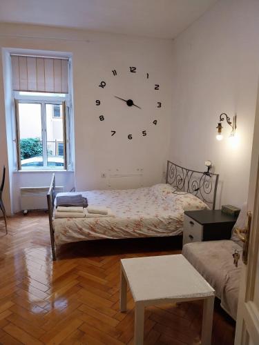 Una cama o camas en una habitación de CENTRAL 4 U Zagreb