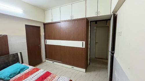 Ένα ή περισσότερα κρεβάτια σε δωμάτιο στο Live with full Pace and Enjoy