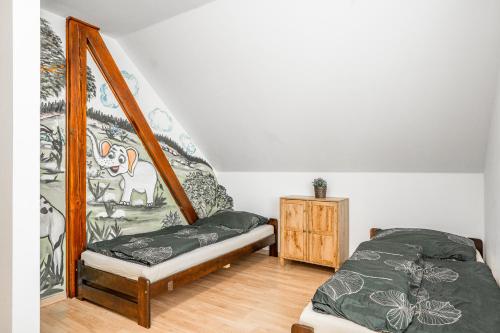 Katil atau katil-katil dalam bilik di Vysočina, Fryšava 199 - Chalupa pod kopcem