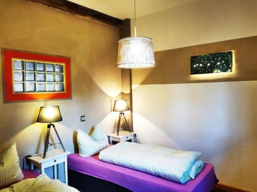 Katil atau katil-katil dalam bilik di Wohnung In Haselberg Mit Großem Garten