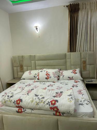 Ένα ή περισσότερα κρεβάτια σε δωμάτιο στο Easy Life Apartment