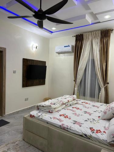 Ένα ή περισσότερα κρεβάτια σε δωμάτιο στο Easy Life Apartment