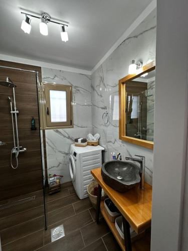 Phòng tắm tại Ανασασμος