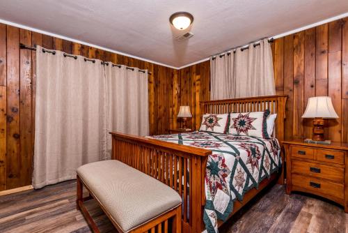 Katil atau katil-katil dalam bilik di Homestead Cabin