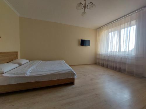 Postel nebo postele na pokoji v ubytování ЖК Центральний біля Авангарду