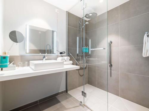 Phòng tắm tại Novotel Regensburg Zentrum