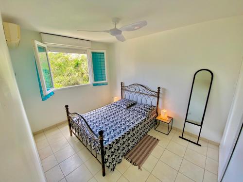 En eller flere senge i et værelse på Appartement - Vue mer et montagne