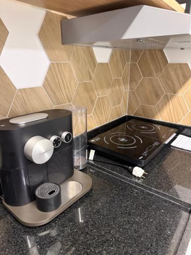 Una cocina o zona de cocina en Studio Moema Completo Com Vaga Grátis e Localização Premium
