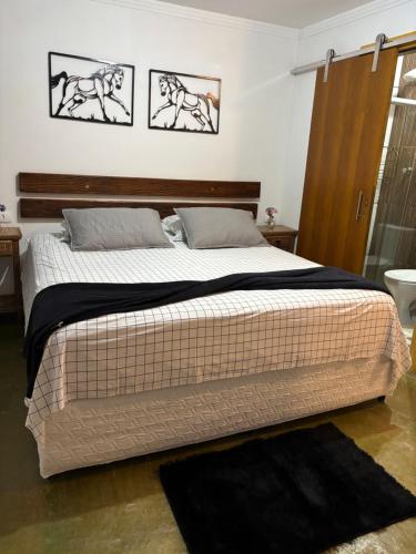 Postel nebo postele na pokoji v ubytování Pousada do Tropeiro