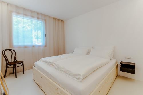 Ένα ή περισσότερα κρεβάτια σε δωμάτιο στο Habitat MAVI