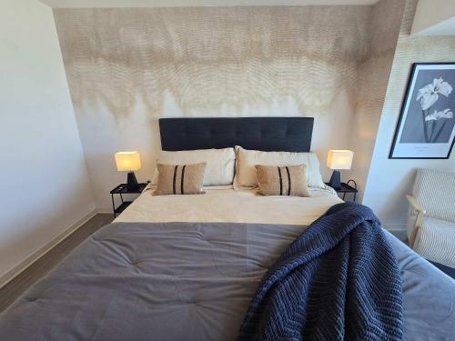 Postel nebo postele na pokoji v ubytování HOM I 2D2B Frente al Mall Antofagasta I Piscina PNM 109