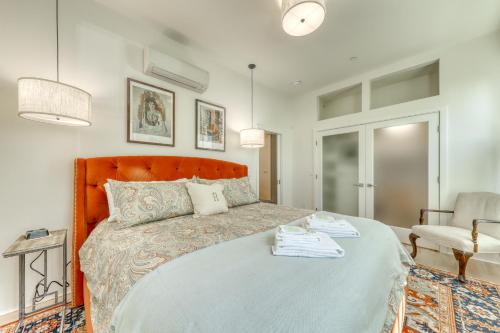 a bedroom with a large bed and a chair at A Foodie s Delight in Portland
