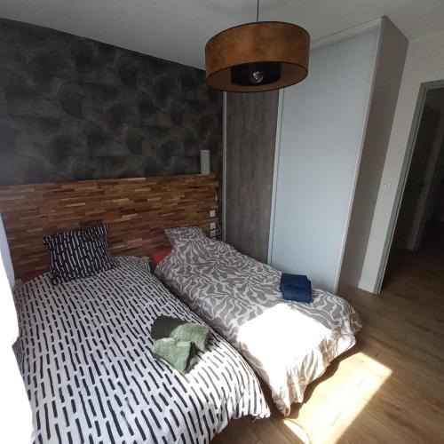 Postel nebo postele na pokoji v ubytování Moulin de la jalousie