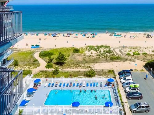 a view of the beach from the balcony of a resort at Ocean Front Sea Terrace 209 Heated Pool in Ocean City