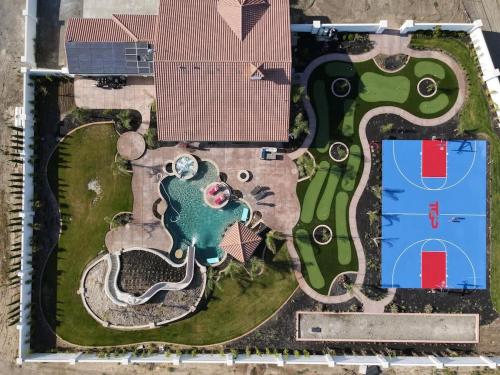 an overhead view of a park with a building at 4BR LUXURY ENTERTAINMENT OASIS in Tracy