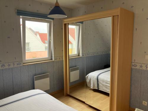 Postel nebo postele na pokoji v ubytování Bleu-De-Toi