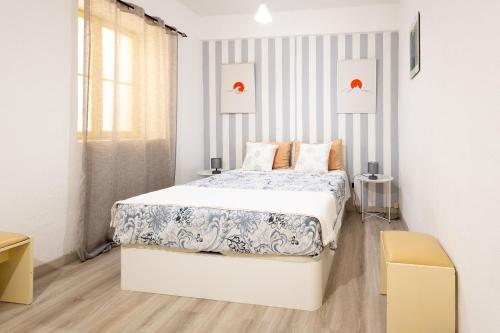 Postel nebo postele na pokoji v ubytování The House